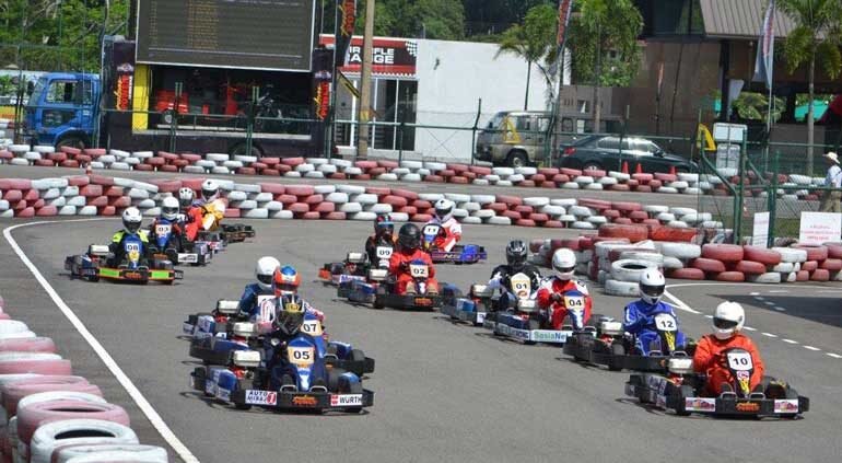 Go-karts racing on the track in Bandaragama