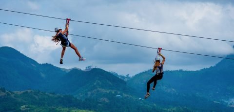 A person on the Flying Ravana zip line in Ella, Sri Lanka